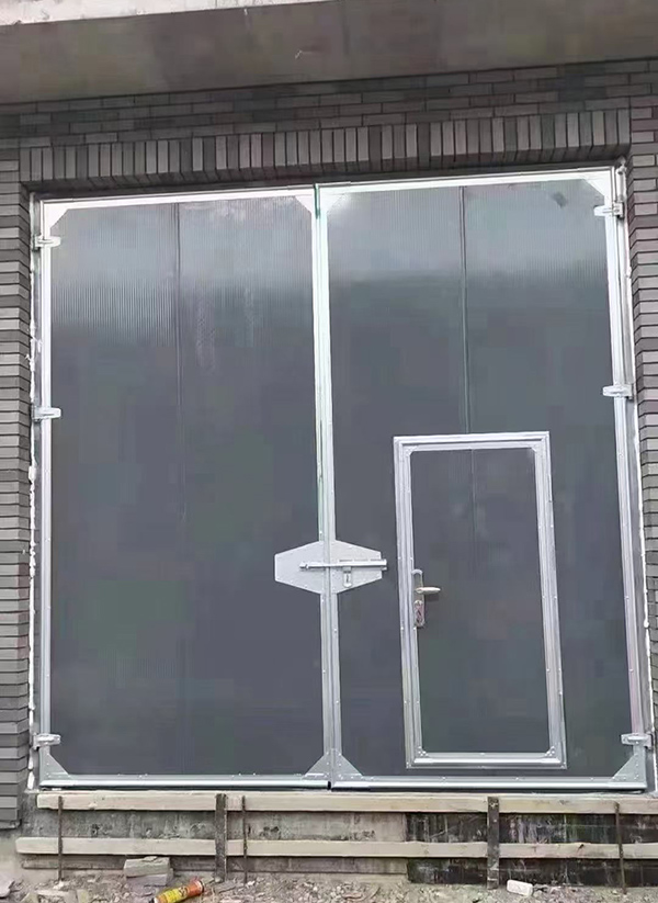 三原工业平开门在大型设备制造车间的应用实例 三原工业平开门在大型设备制造车间的应用实例